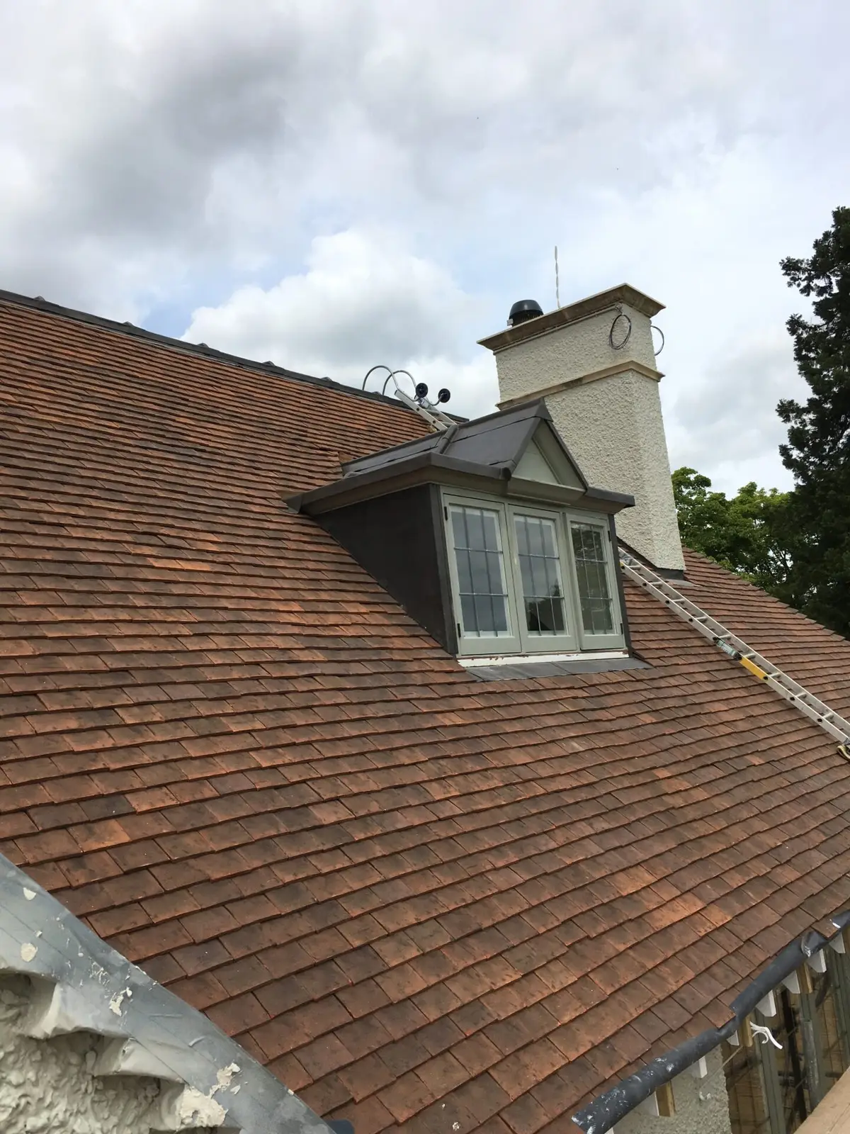 Clay tile roof with a dormer