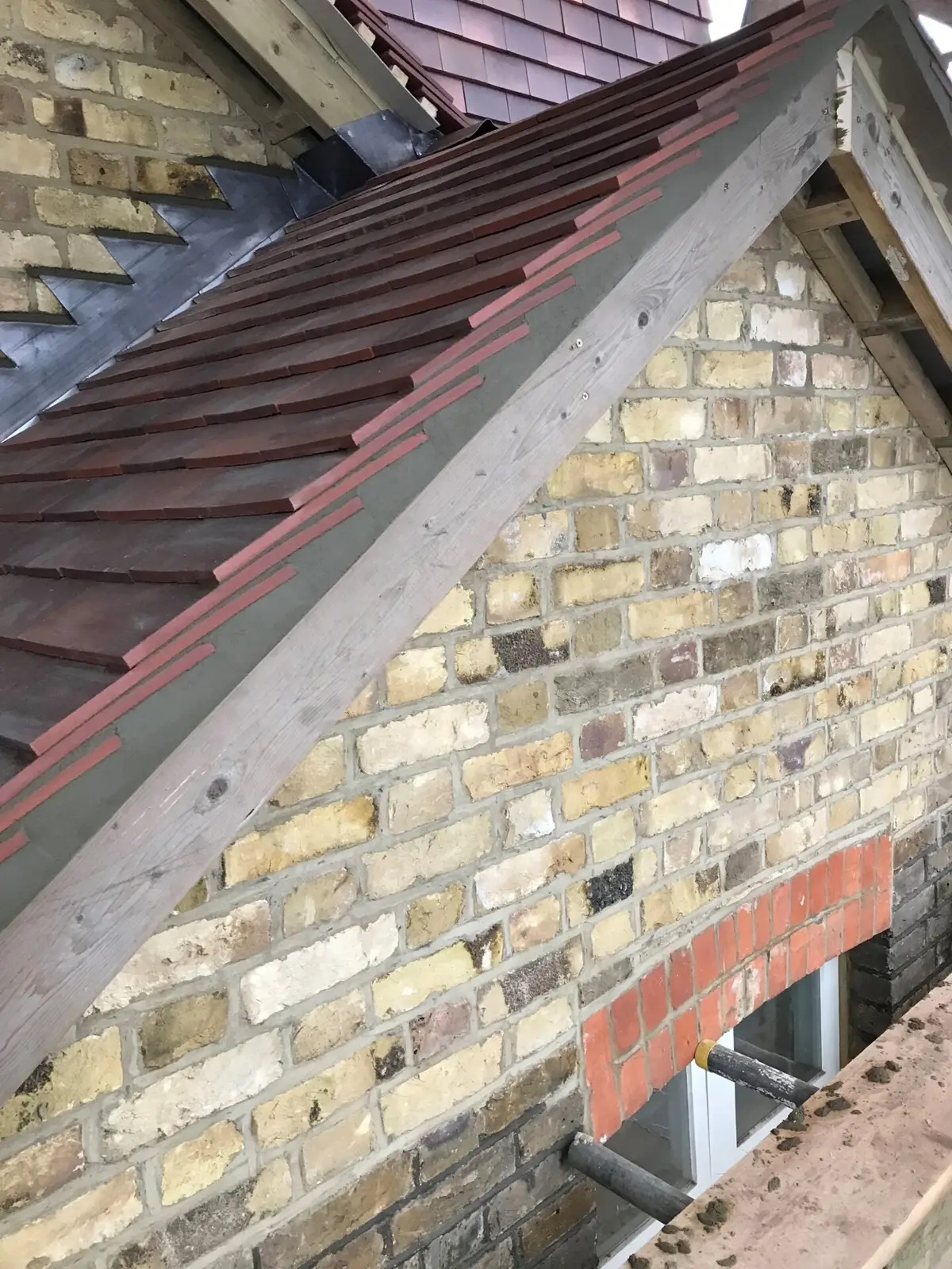 Clay tile verge on a brick gable