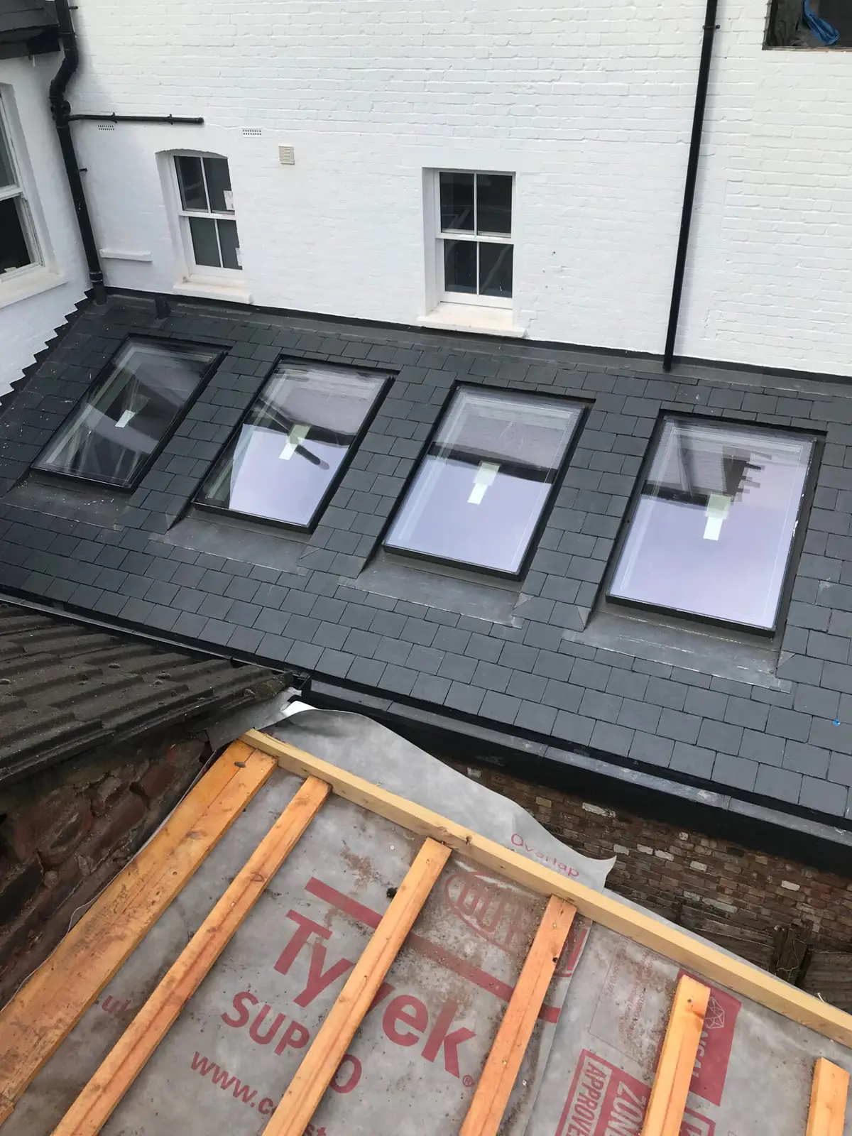 Four roof windows fitted in a new roof