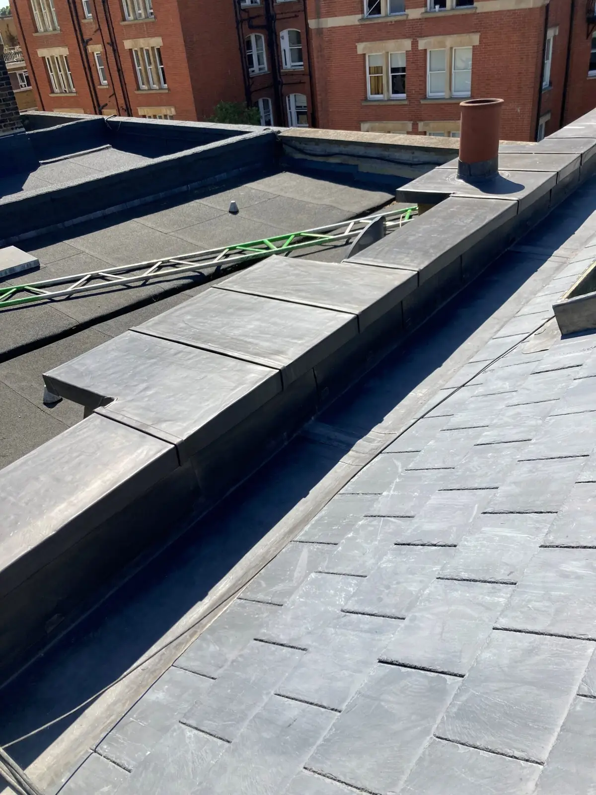New lead flashing on a slate roof