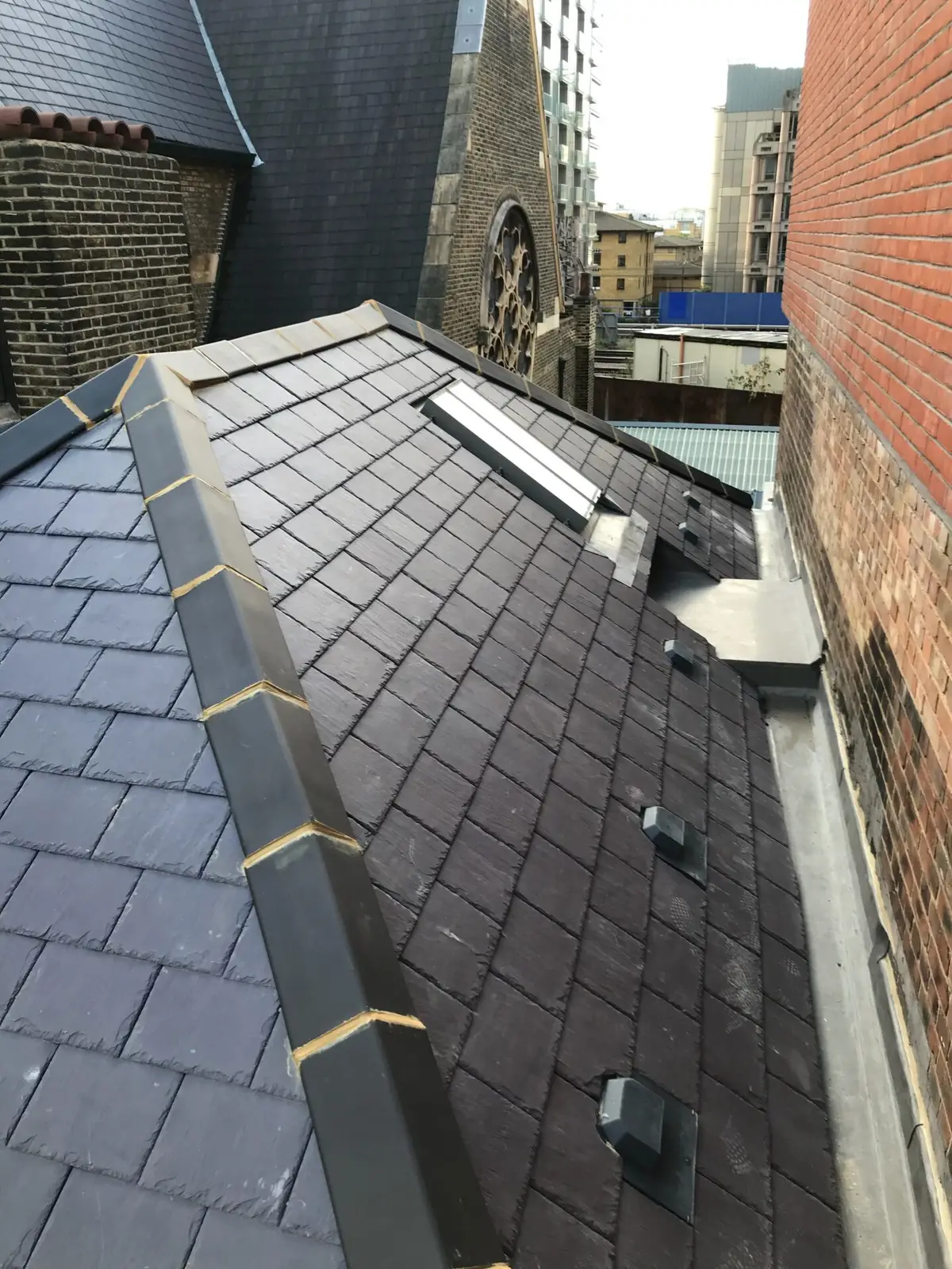 Slate roof with a lead valley